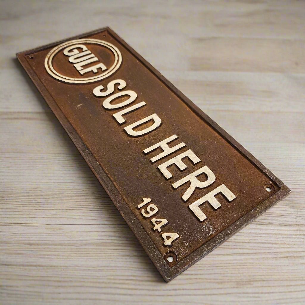 Gulf Sold Here 1944 Embossed Cast Iron Plaque With Antique Finish (11" x 4.5") - Jones Peak