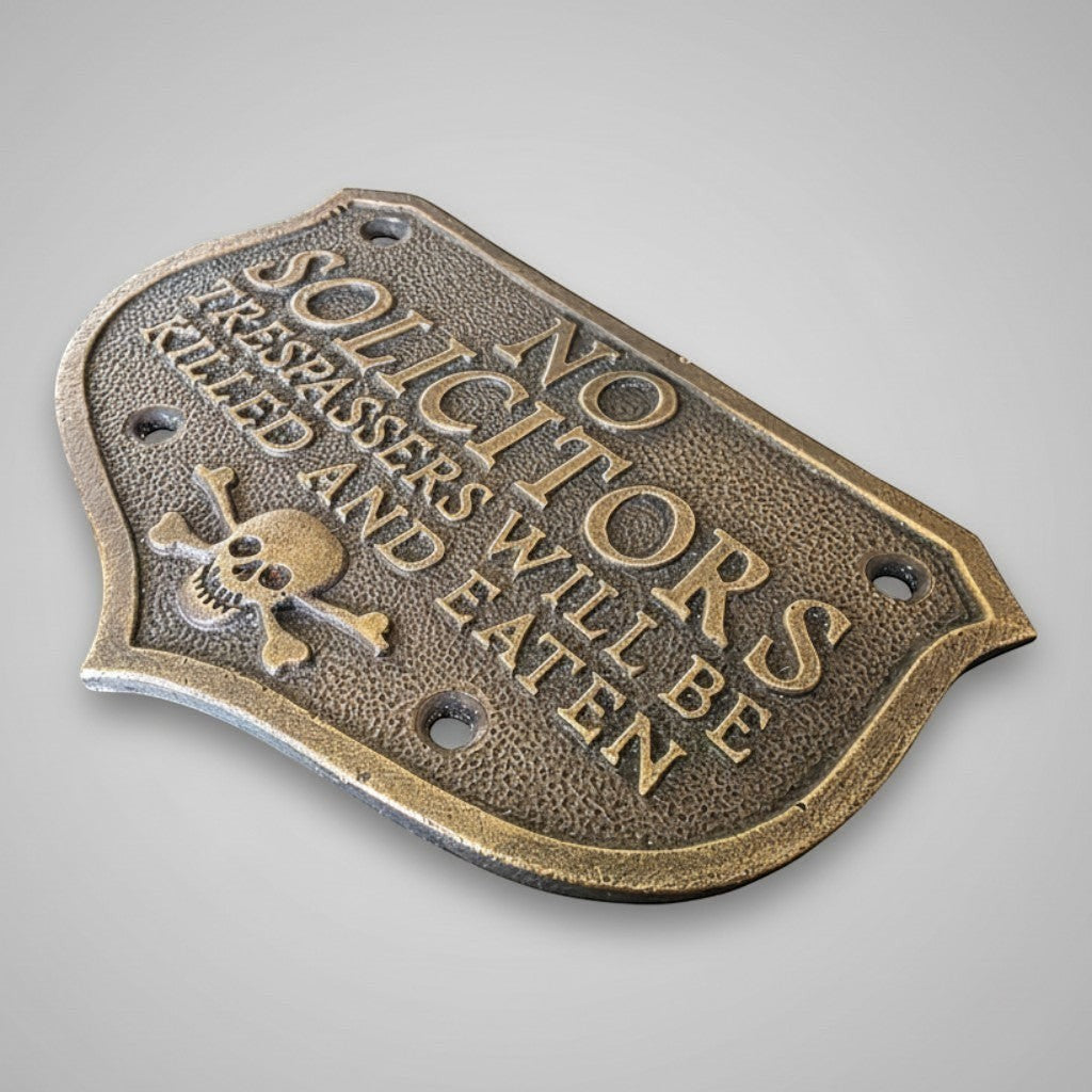 Jones Peak solid brass plaque with pirate skull and No Solicitors text in an antique hand-painted patina finish.