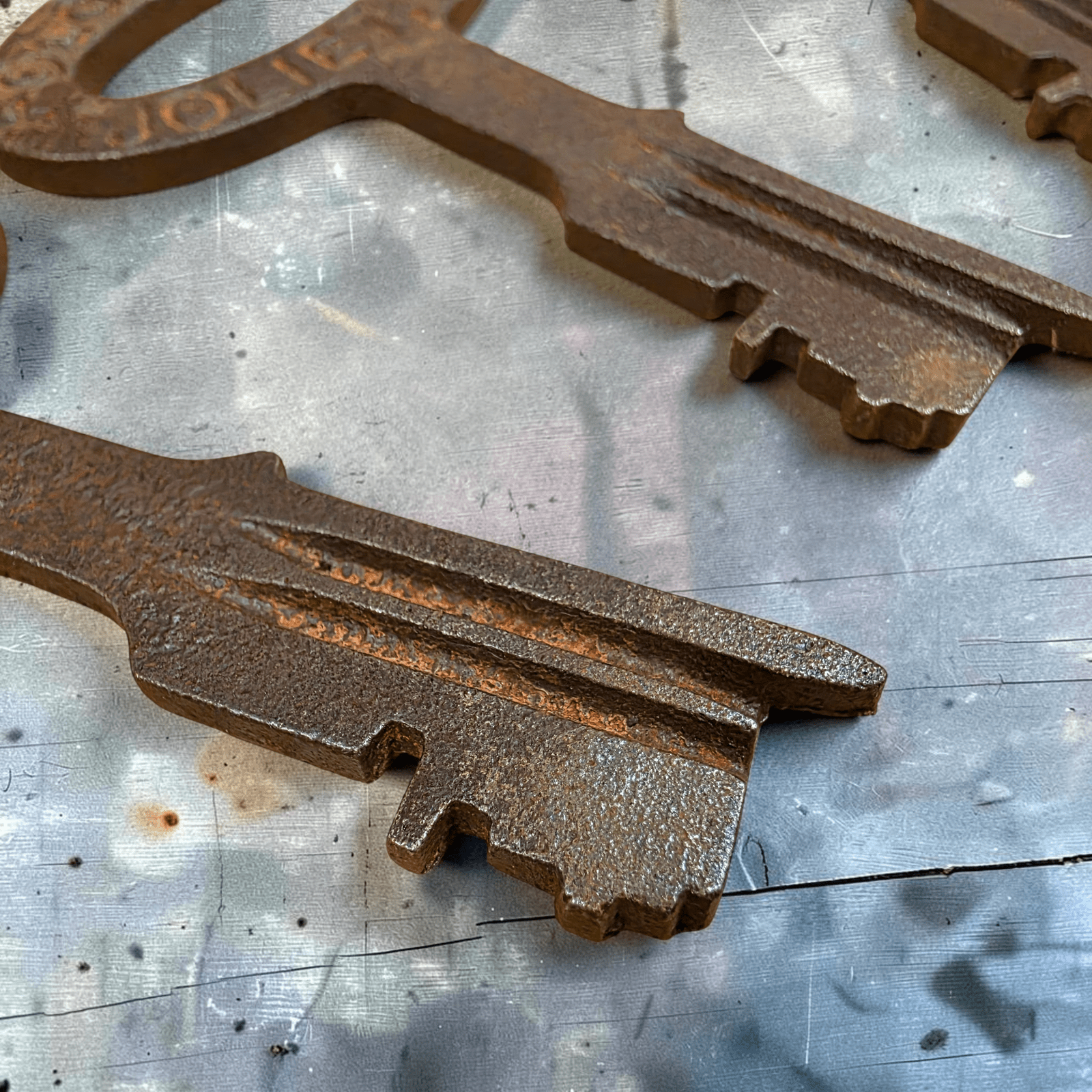 Jones Peak set of five distressed cast iron jailhouse keys with antique finish and Folger Adam Joliet lettering