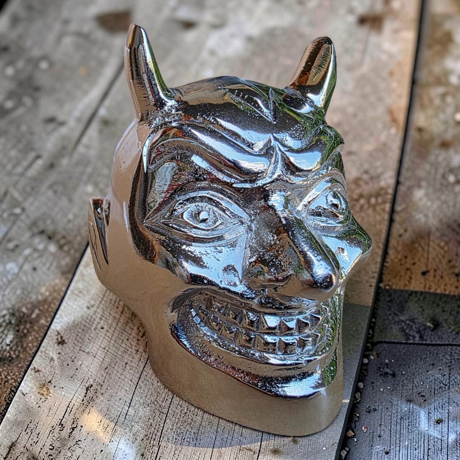 Jones Peak chrome-plated aluminum devil gear shift knob with a polished finish for automotive decor.