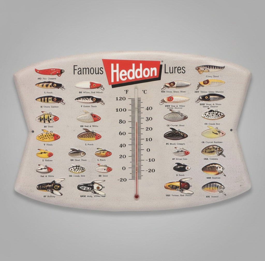 Jones Peak embossed metal wall thermometer featuring vintage Heddon fishing lure illustrations and dual temp scale