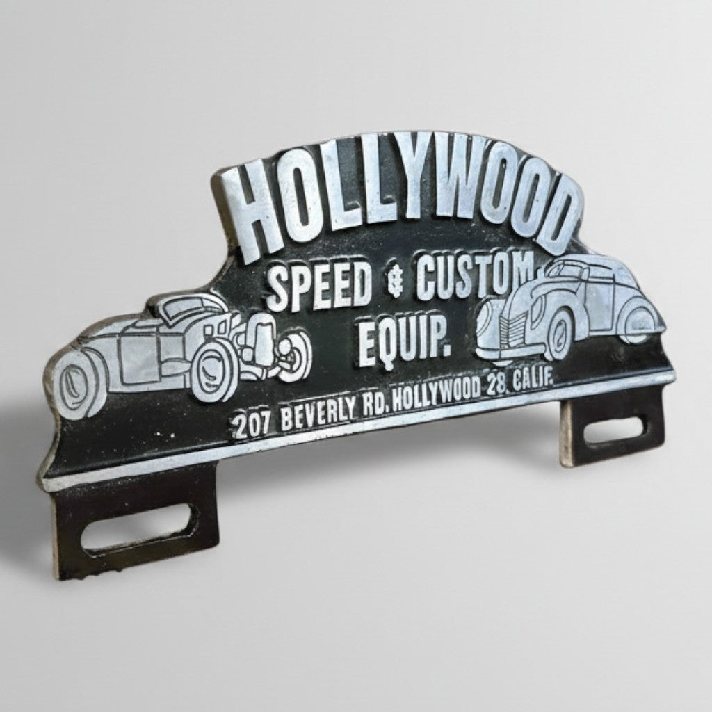 Jones Peak vintage-style aluminum Hollywood Speed & Custom license plate topper with an antique patina finish.