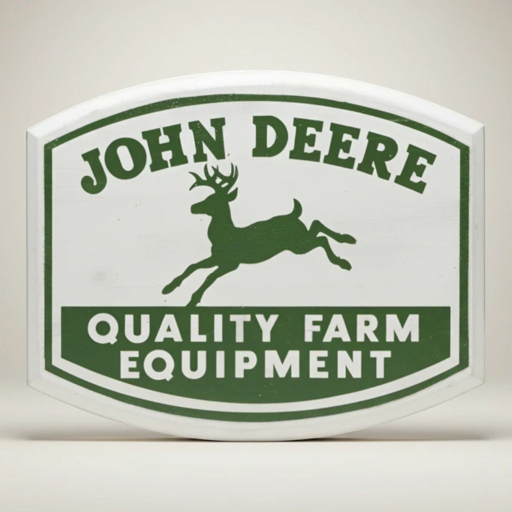 Jones Peak John Deere wood magnet with green deer logo and "Quality Farm Equipment" text. White wood.