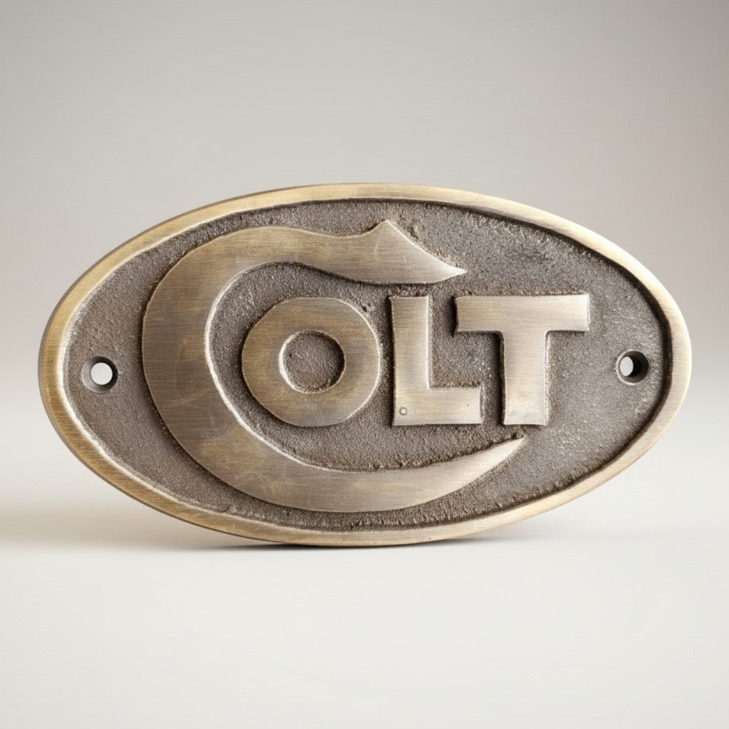 Jones Peak Western Firearms solid brass plaque with raised COLT lettering and antique patina finish.