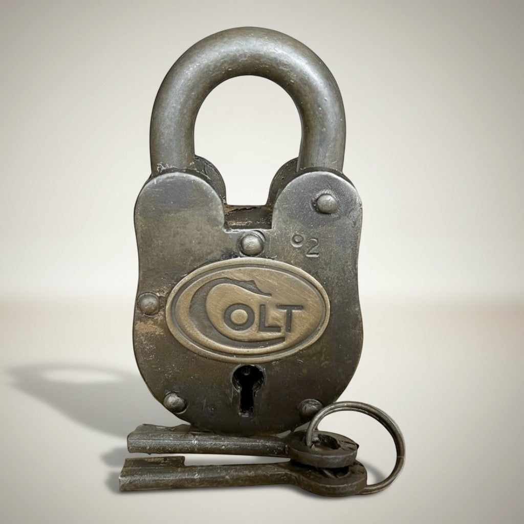 Jones Peak Old West cast iron lock with keys, decorative reproduction with antique finish and 'COLT' emblem.