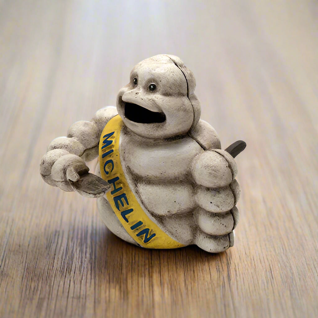 Tire Man Cast Iron Mechanical Coin Bank With Painted Antique Finish (4.5" x 5.5")