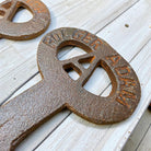 Jones Peak Folger Adams cast iron keys detail view with antique finish and embossed lettering.