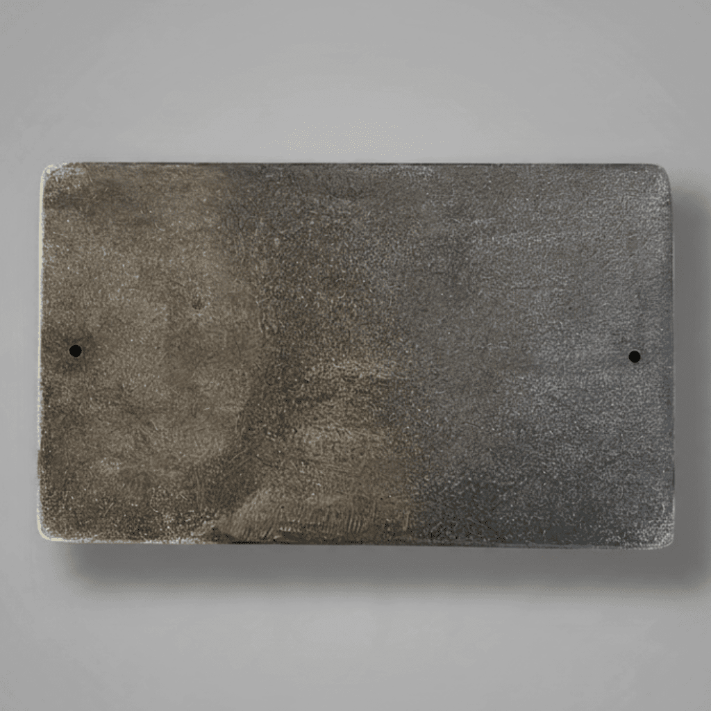 Jones Peak rectangular cast iron plaque with an antique finish and two mounting holes for wall display.