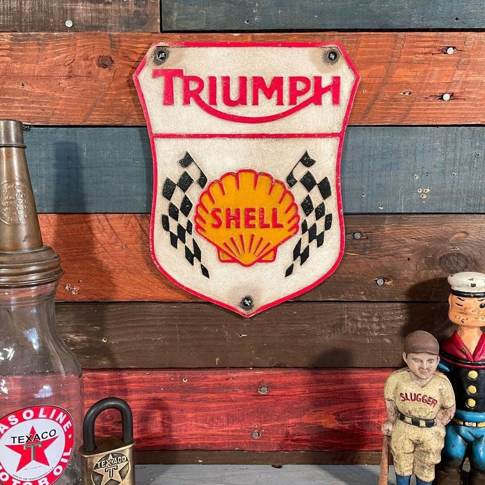 Triumph Shell Cast Iron Plaque With Painted Antique Finish (10.75" x 8.75")