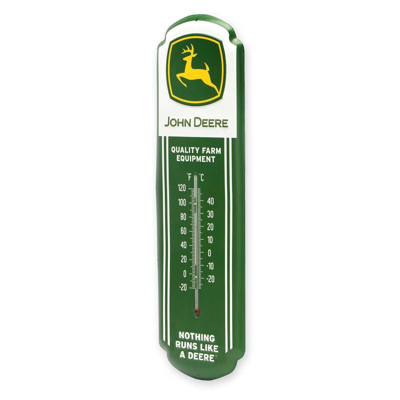 Angled view of John Deere Farm Equipment metal wall thermometer showing the embossed shape and hanging hole