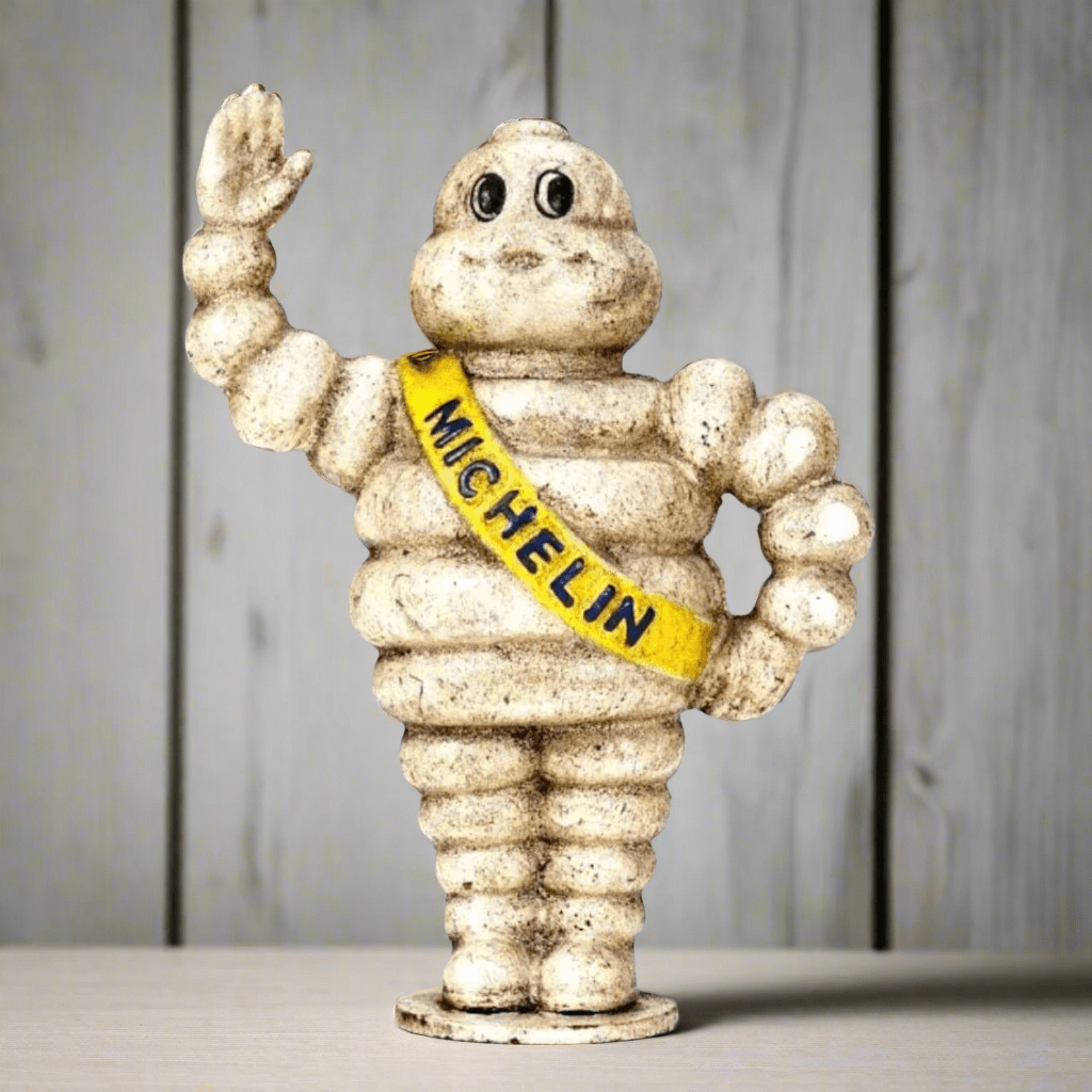 Tire Man Cast Iron Coin Bank With Painted Antique Finish (6.5" x 6") - Jones Peak