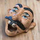 Man Four - Eyed Wall Mounted Cast Iron Bottle Opener With Painted Antique Finish (3.5" x 3.5") - Jones Peak