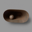 Jones Peak rustic cast iron cow bell with an antique patina finish and interior clapper, viewed from above.