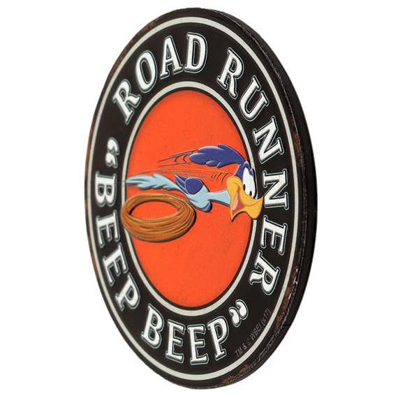 Angled view of the Road Runner Beep Beep orange embossed metal magnet