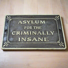 Asylum For The Criminally Insane Cast Iron Plaque With Raised Lettering & Antique Finish (5" x 8") - Jones Peak