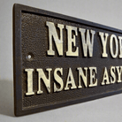 New York Insane Asylum Cast Iron Plaque With Antique Finish (7.75" x 3.5") - Jones Peak