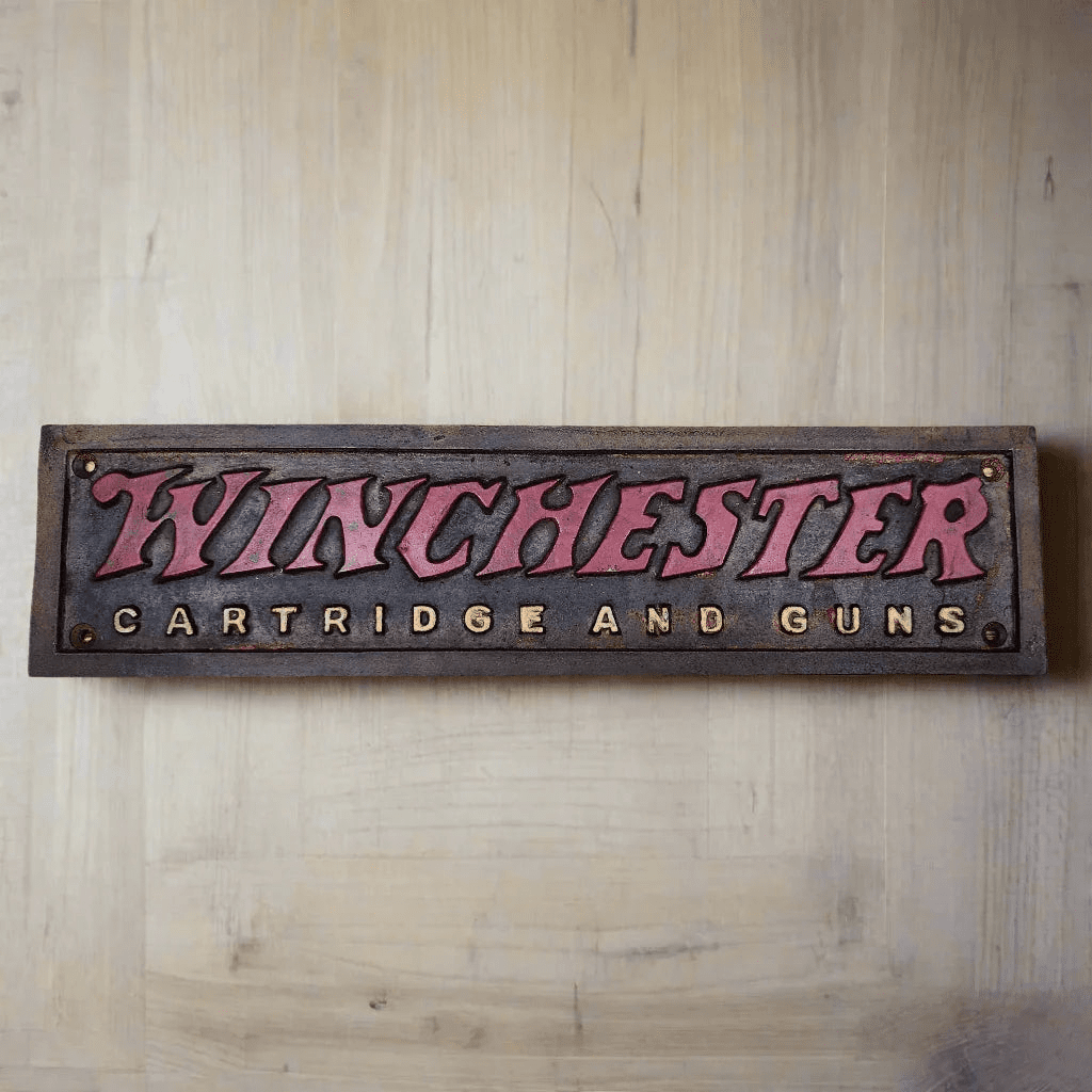 Winchester Cartridges And Guns Cast Iron Plaque With Painted Antique Finish (13.5" x 3") - Jones Peak