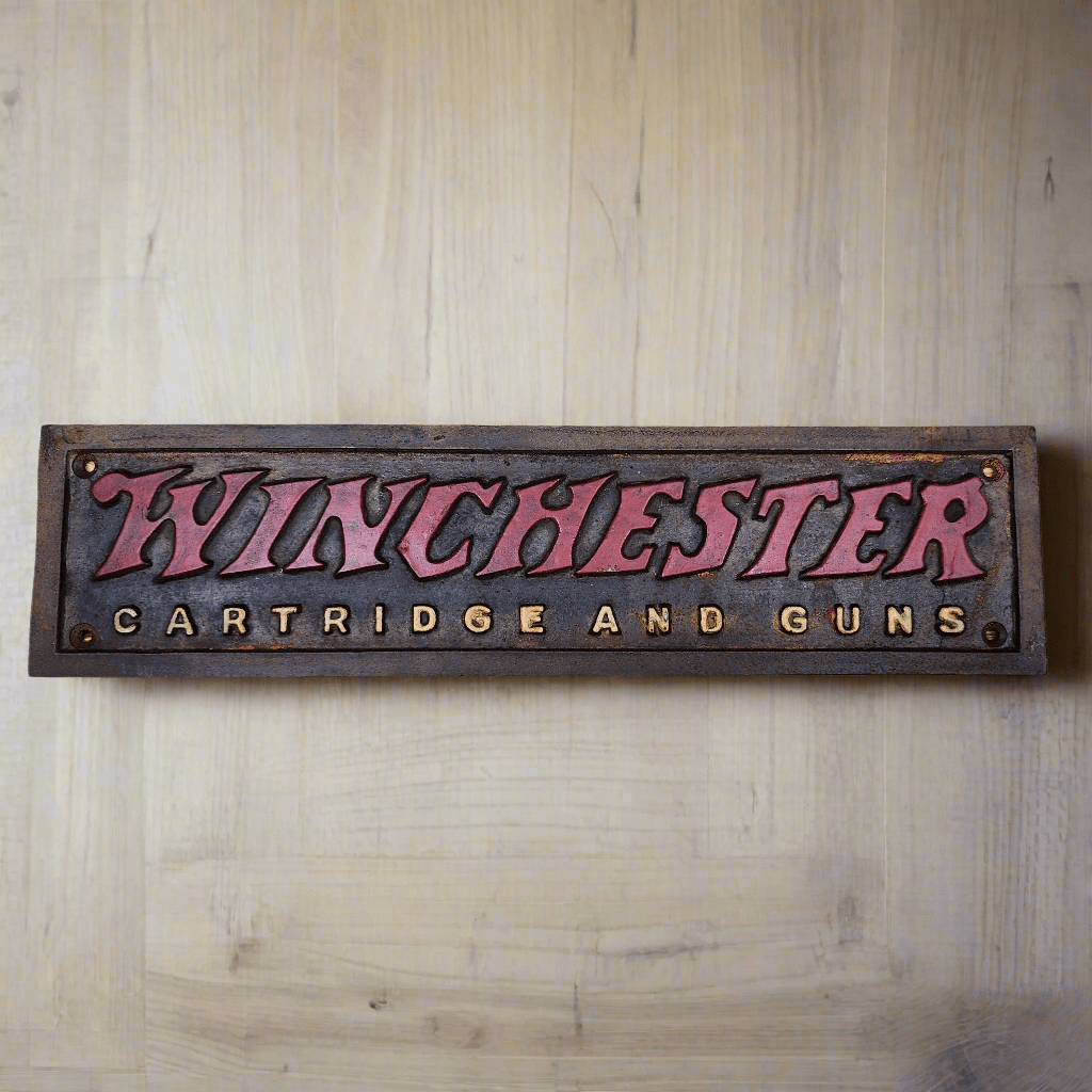 Winchester Cartridges And Guns Cast Iron Plaque With Painted Antique Finish (13.5" x 3") - Jones Peak