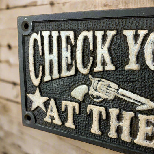 Check Your Guns At The Door Cast Iron Wall Plaque Sign With Antique Finish (7.75" x 3.5") - Jones Peak