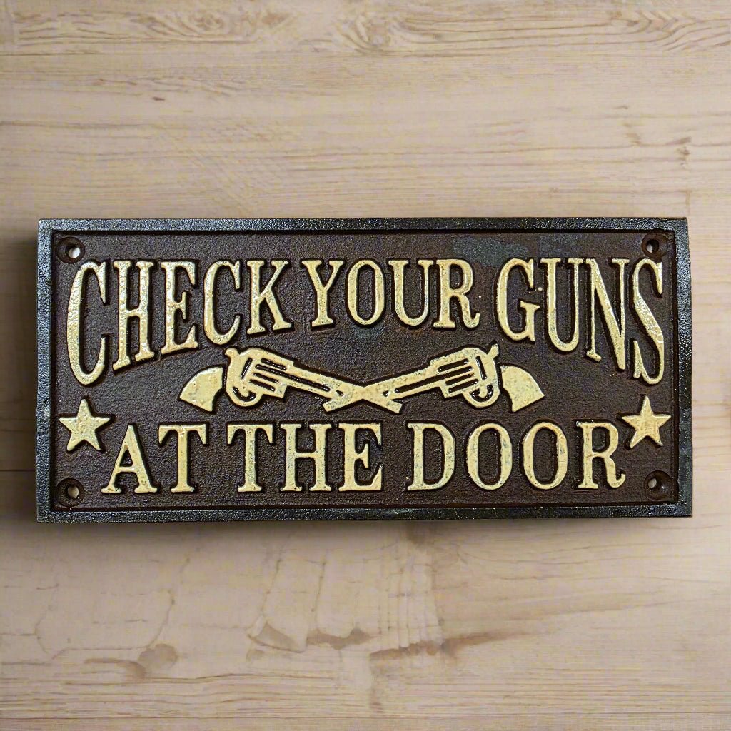 Check Your Guns At The Door Cast Iron Wall Plaque Sign With Antique Finish (7.75" x 3.5") - Jones Peak