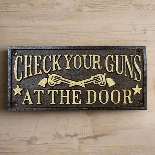 Check Your Guns At The Door Cast Iron Wall Plaque Sign With Antique Finish (7.75" x 3.5") - Jones Peak