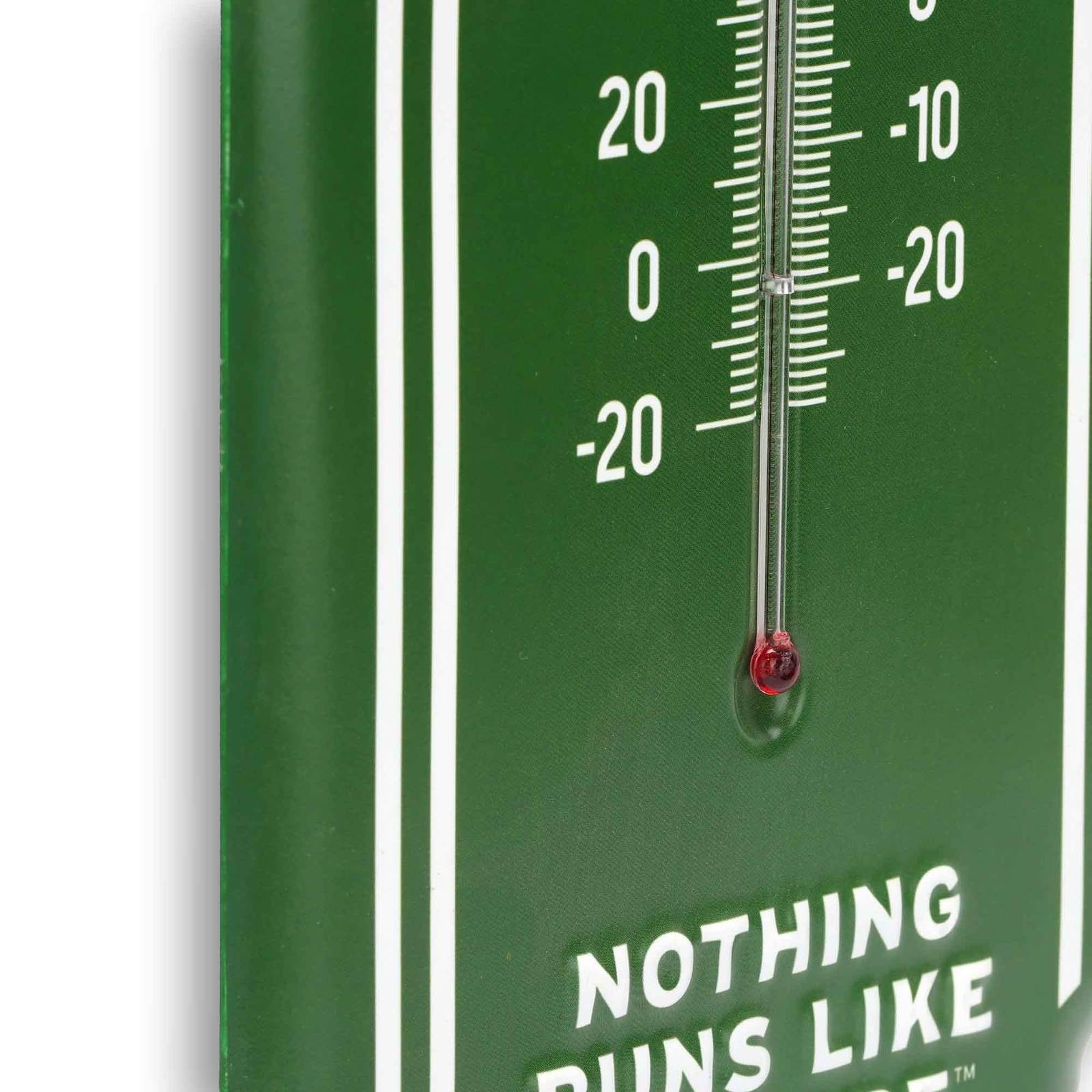 Close-up of John Deere Farm Equipment wall thermometer showing the temperature tube and Fahrenheit and Celsius scales