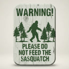 Jones Peak Bigfoot Sasquatch Do Not Feed Magnet with vintage design on wood background.