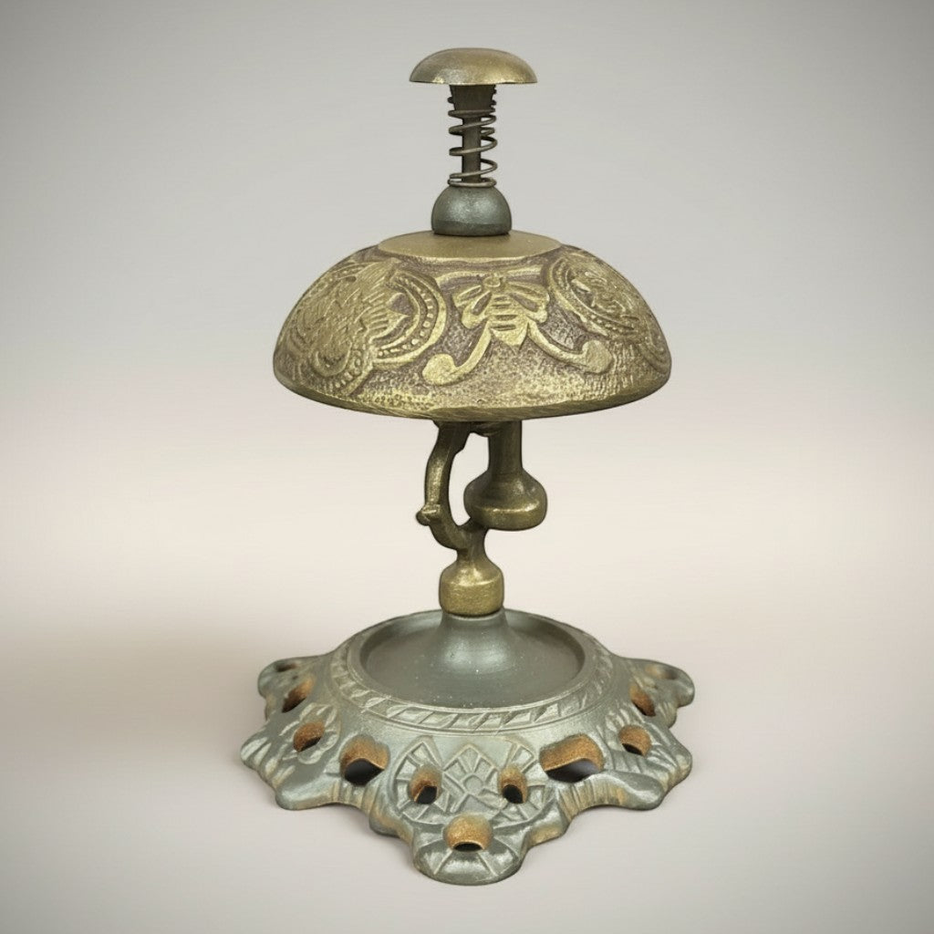 Jones Peak butterfly engraved solid brass hotel desk bell on stand with hand-antiqued patina.