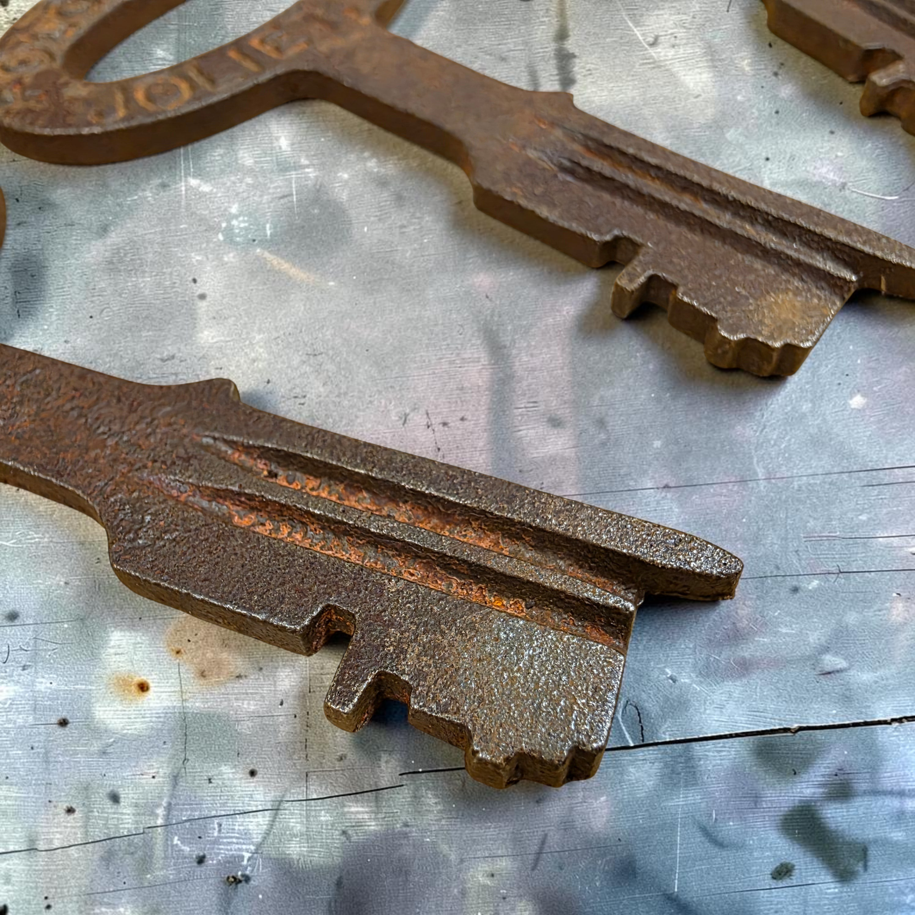Jones Peak set of five distressed cast iron jailhouse keys with antique finish and Folger Adam Joliet lettering