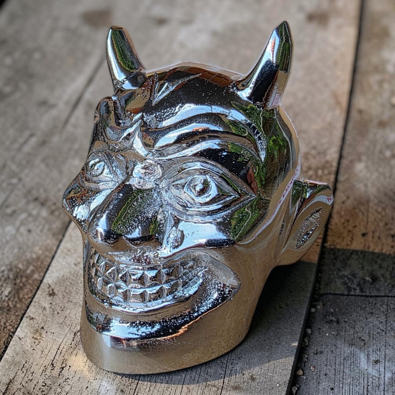 Jones Peak chrome-plated aluminum devil gear shift knob with a polished finish for automotive decor.