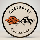 Jones Peak vintage round Corvette '53 logo metal sign with checkered flags and Chevrolet text.