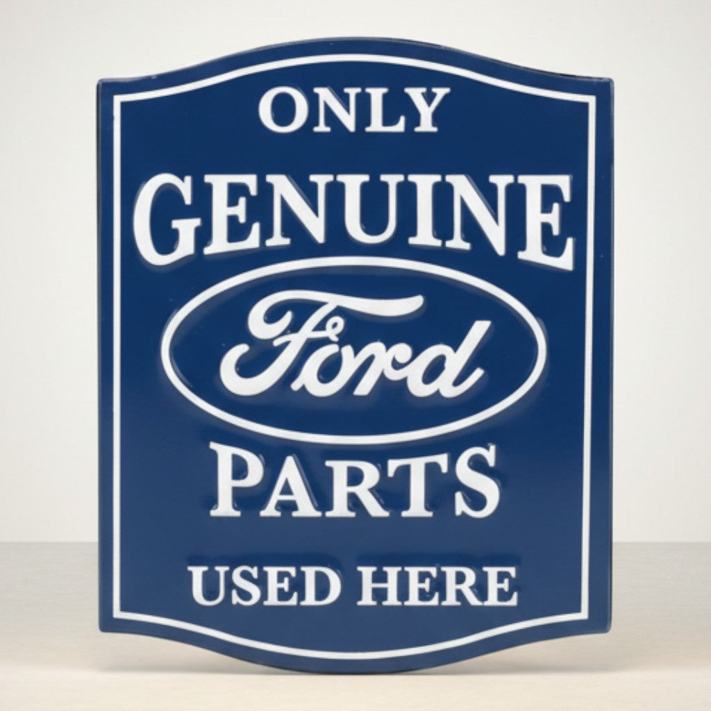 Jones Peak Ford Genuine Parts embossed metal magnet, dark blue with white lettering and Ford oval logo.