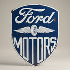 Jones Peak Ford Motors vintage shield metal magnet with blue background and white lettering.