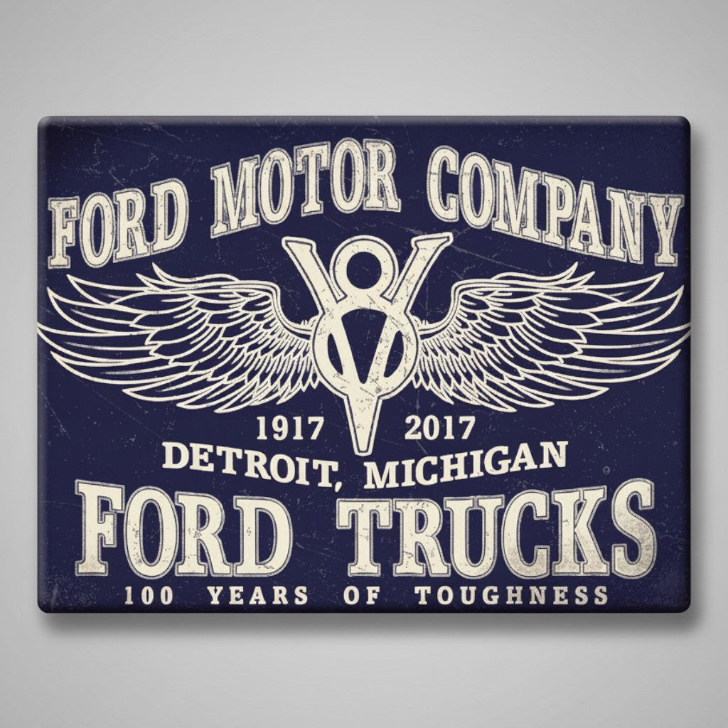 Jones Peak Ford Trucks 100 Years of Toughness metal magnet with vintage blue and white V8 logo design.