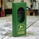 Jones Peak John Deere metal wall bottle opener in green with yellow logo and text.