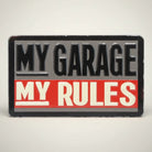 Jones Peak My Garage My Rules embossed metal magnet with vintage charm. Black and red design.