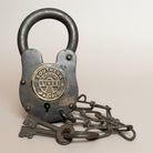 Jones Peak Railroad cast iron lock with chain and brass tag, featuring Southern Pacific Lines logo. Includes two keys.