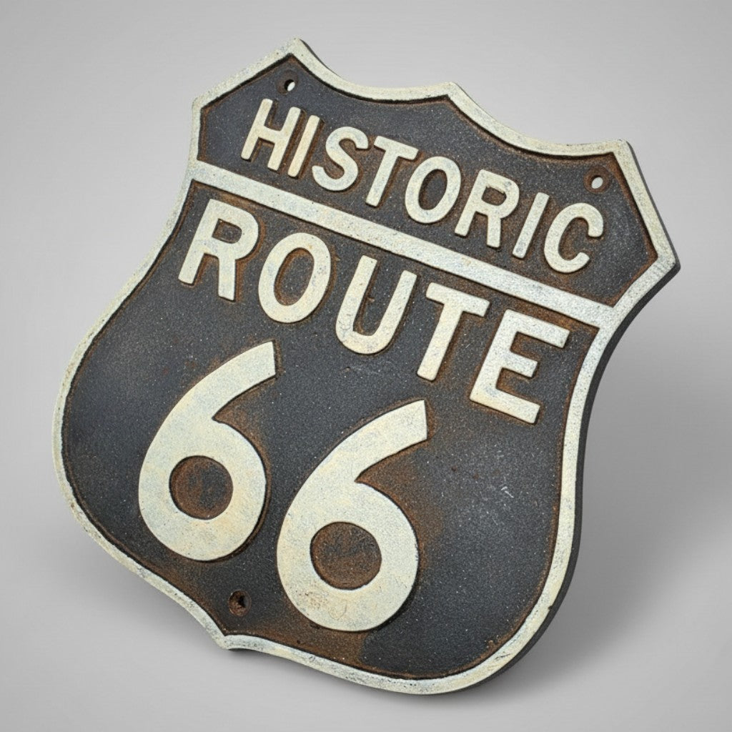 Jones Peak cast iron Route 66 embossed plaque with a hand-painted antique patina for vintage garage decor.