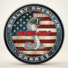 Jones Peak Shelby American Garage Magnet featuring a cobra on a distressed American flag. Round metal magnet.