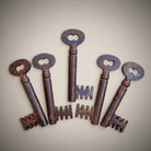 Jones Peak set of 5 dungeon cast iron skeleton keys with antique distressed finish, 4.25" long.