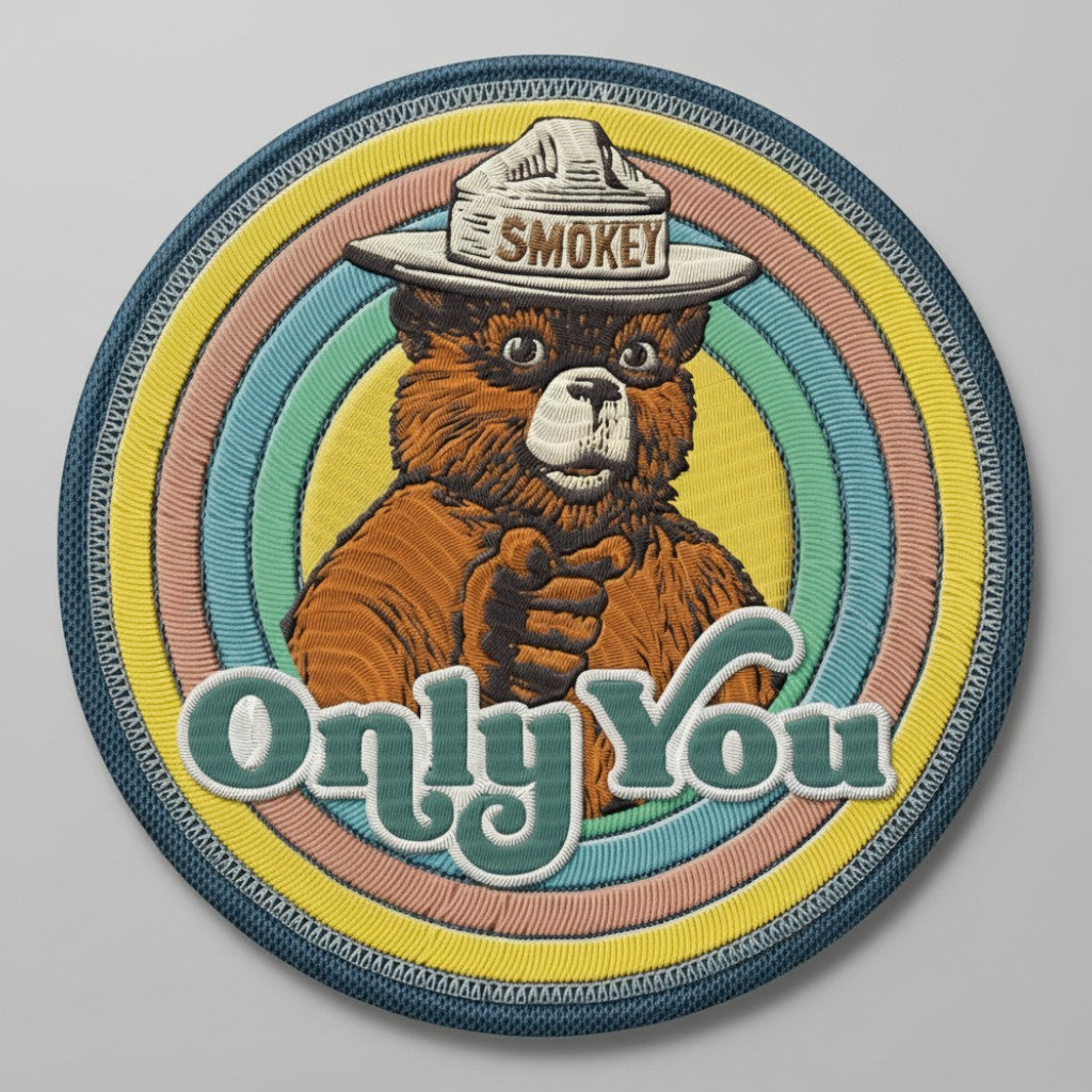 Jones Peak round 3-inch Smokey Bear Only You metal magnet with vintage-style colorful concentric circle design.