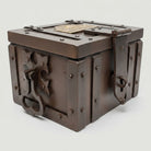 Jones Peak Winchester 1866 cast iron strong box with ornate handle and brass tag. Distressed dark brown finish.