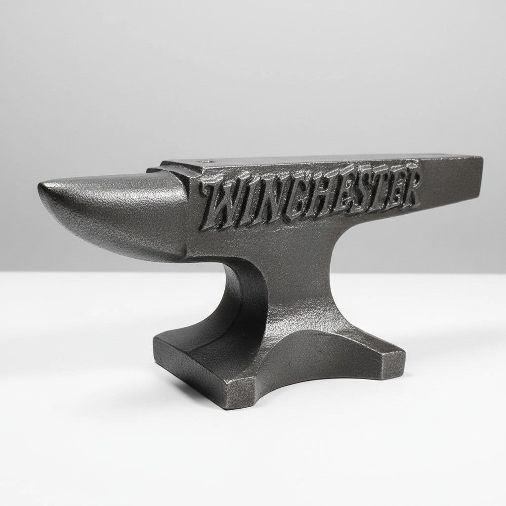 Jones Peak Winchester 1929 cast iron anvil paperweight with a hand-antiqued distressed finish for industrial decor.