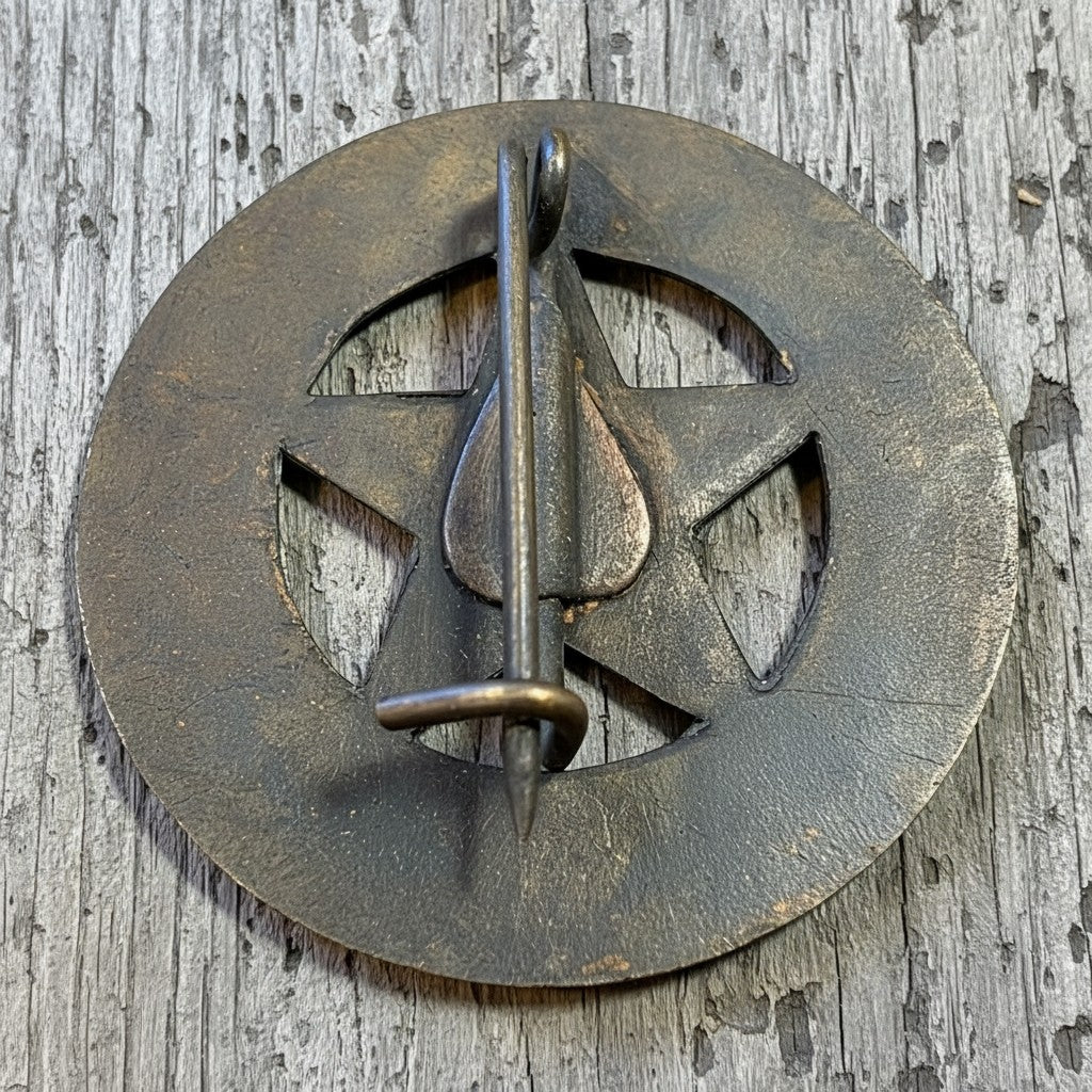 Jones Peak solid brass Texas Ranger badge with antique finish and star cutouts. Decorative reproduction with pin back.