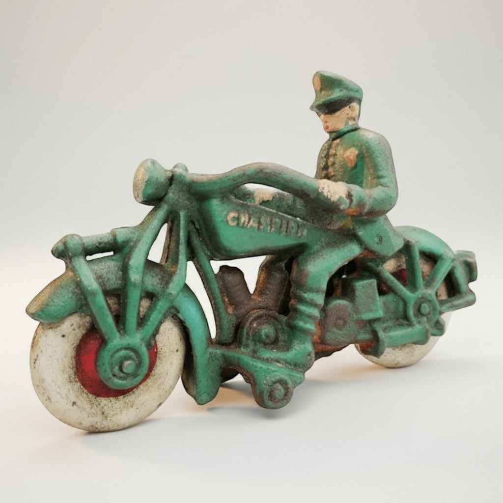 Jones Peak cast iron toy motorcycle with rider, antique green finish, vintage-inspired.
