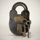 Jones Peak San Quentin Death Row cast iron padlock with two keys. Antique, distressed finish.