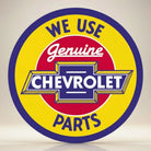 Jones Peak Chevy Round Genuine Parts metal sign with blue, yellow, and red circular design featuring the Chevrolet bowtie logo.