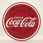 Jones Peak Coca-Cola round metal sign with vintage distressed red finish and white lettering.