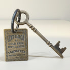 Jones Peak Gem Saloon 1886 Tombstone brothel room brass tag and key with antique finish.