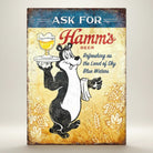 Jones Peak Hamms Beer metal sign with cartoon bear serving a glass of beer. Vintage distressed look.